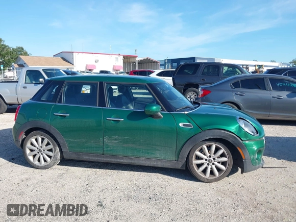 2020 MINI Hardtop 4 Door Cooper with VIN WMWXU7C06L2M63032, listed as a IAAI auction lot 42572567 with 86,220 mi miles and . Bid and sale history available at DreamBid. Image 13.