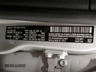 2020 Jeep Renegade Sport z VIN ZACNJBAB0LPL24947, wystawiony jako Copart lot #54792725 z przebiegiem 75 045 mil mil oraz Czysty tytuł • Clean title. Historia ofert i sprzedaży dostępna na DreamBid. Obrazek 13.