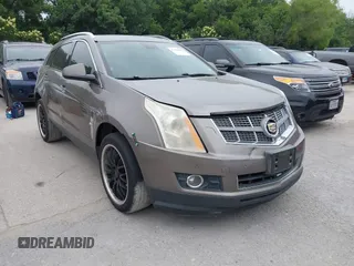 2011 Cadillac SRX Performance Collection z VIN 3GYFNBEY9BS613164, wystawiony jako IAAI lot #42329050 z przebiegiem 86 250 mil mil oraz . Historia ofert i sprzedaży dostępna na DreamBid. Obrazek 1.