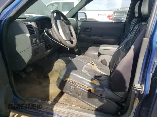 2006 GMC Canyon SLE2 with VIN 1GTDT136968311810, listed as a Copart auction lot 77146164 with 243,109 mi miles and Salvage Title. Bid and sale history available at carsss.com. Image 7.