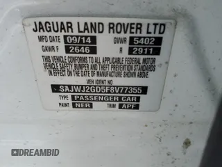 2015 Jaguar XJ Portfolio z VIN SAJWJ2GD5F8V77355, wystawiony jako Copart lot #47214835 z przebiegiem 73 202 mil mil oraz Szkoda całkowita • Salvage title. Historia ofert i sprzedaży dostępna na DreamBid. Obrazek 12.