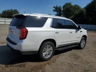 2021 GMC Yukon SLT with VIN 1GKS1BKT0MR425247, listed as a Copart auction lot 69205584 with 72,952 mi miles and Salvage Title. Bid and sale history available at carsss.com. Image 3.