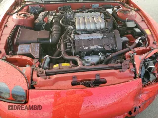 1997 Mitsubishi 3000GT GT z VIN JA3AM84J2VY005945, wystawiony jako Copart lot #85320754 z przebiegiem 143 261 mil mil oraz Szkody całkowita. Historia ofert i sprzedaży dostępna na DreamBid. Obrazek 11.