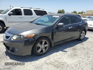 2009 Acura TSX with VIN JH4CU266X9C024552, listed as a Copart auction lot 60822145 with 210,678 mi miles and Salvage title. Bid and sale history available at DreamBid. Image 1.