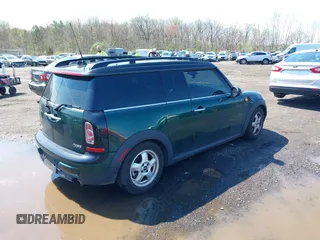 2011 MINI Clubman z VIN WMWZF3C57BT187802, wystawiony jako IAAI lot #39206880 z przebiegiem 93 476 mil mil oraz . Historia ofert i sprzedaży dostępna na DreamBid. Obrazek 4.