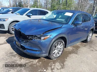 2020 Mazda CX-5 Grand Touring with VIN JM3KFBDM9L0756826, listed as a IAAI auction lot 41866290 with 145,567 mi miles. Bid and sale history available at carsss.com. Image 17.
