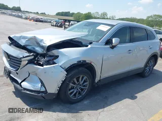 2020 Mazda CX-9 Touring with VIN JM3TCBCY2L0415513, listed as a IAAI auction lot 42481543 with 47,294 mi miles and . Bid and sale history available at DreamBid. Image 2.