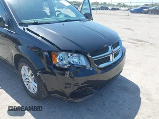 2019 Dodge Grand Caravan SXT with VIN 2C4RDGCG5KR739144, listed as a IAAI auction lot 42175888 with 43,577 mi miles and . Bid and sale history available at DreamBid. Image 6.