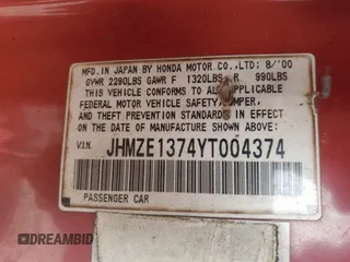 2000 Honda Insight z VIN JHMZE1374YT004374, wystawiony jako Copart lot #51375055 z przebiegiem 221 981 mil mil oraz Szkoda całkowita • Salvage title. Historia ofert i sprzedaży dostępna na DreamBid. Obrazek 13.