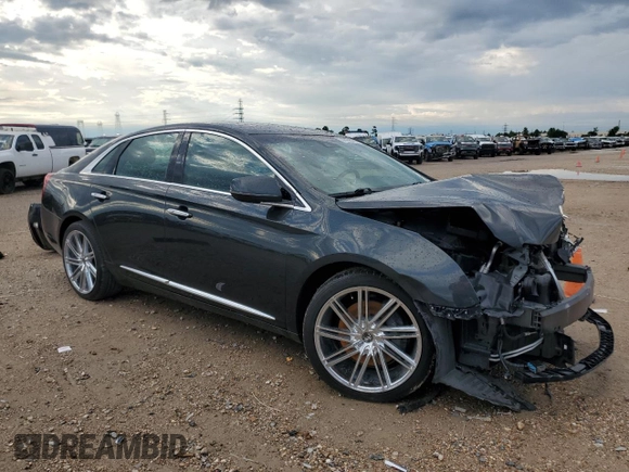 2013 Cadillac XTS Luxury z VIN 2G61P5S33D9217027, wystawiony jako Copart lot #56358835 z przebiegiem 82 644 mil mil oraz Szkoda całkowita • Salvage title. Historia ofert i sprzedaży dostępna na DreamBid. Obrazek 4.