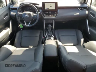 2023 Toyota Corolla Cross XLE с VIN 7MUDAAAG2PV070208, выставлен на аукционе Copart как лот 52105375 с пробегом 20 643 миль миль и Списание • Salvage title. История ставок и продаж доступна на DreamBid. Изображение 8.