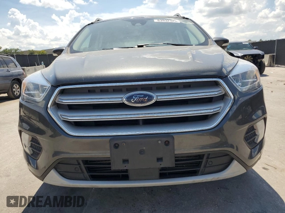2019 Ford Escape Titanium z VIN 1FMCU9J96KUA65154, wystawiony jako Copart lot #63932325 z przebiegiem 117 963 mil mil oraz Czysty tytuł • Clean title. Historia ofert i sprzedaży dostępna na DreamBid. Obrazek 5.