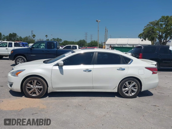 2015 Nissan Altima S with VIN 1N4AL3AP5FN405734, listed as a IAAI auction lot 42059082 with 90,651 mi miles and . Bid and sale history available at DreamBid. Image 14.