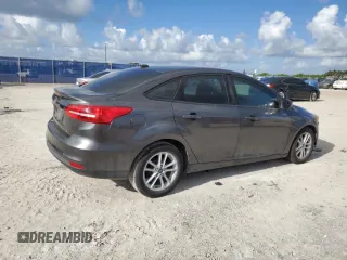 2018 Ford Focus SE with VIN 1FADP3F21JL298832, listed as a Copart auction lot 61262655 with 122,331 mi miles and Clean title. Bid and sale history available at DreamBid. Image 3.