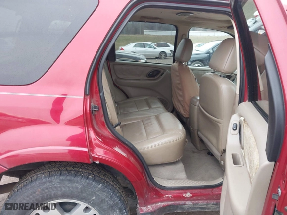 2005 Ford Escape Limited with VIN 1FMYU04155KA77626, listed as a IAAI auction lot 41368626 with 215,182 mi miles. Bid and sale history available at carsss.com. Image 8.