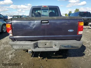 1999 Ford Ranger XL with VIN 1FTYR14X4XTA34313, listed as a Copart auction lot 71479024 with 201,949 mi miles and Salvage Title. Bid and sale history available at carsss.com. Image 6.