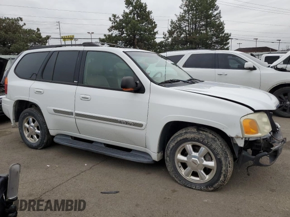 2003 GMC Envoy SLT with VIN 1GKDT13S332293112, listed as a Copart auction lot 43721225 with 139,471 mi miles and Salvage Title. Bid and sale history available at carsss.com. Image 4.