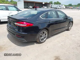 2019 Ford Fusion Titanium z VIN 3FA6P0RU0KR260239, wystawiony jako IAAI lot #42436643 z przebiegiem 114 631 mil mil oraz . Historia ofert i sprzedaży dostępna na DreamBid. Obrazek 4.