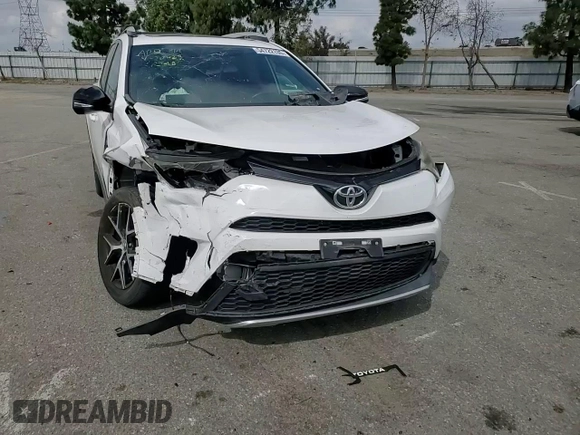 2016 Toyota RAV4 SE with VIN 2T3NFREV4GW263191, listed as a Copart auction lot 54722135 with Not provided miles and Salvage title. Bid and sale history available at DreamBid. Image 14.