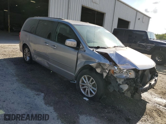 2016 Dodge Grand Caravan SXT with VIN 2C4RDGCG4GR176028, listed as a Copart auction lot 54920445 with 157,131 mi miles and Salvage Title. Bid and sale history available at DreamBid. Image 4.