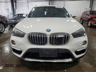 2018 BMW X1 xDrive28i with VIN WBXHT3C30J5L33646, listed as a Copart auction lot 46707525 with 82,656 mi miles and Salvage Title. Bid and sale history available at carsss.com. Image 5.