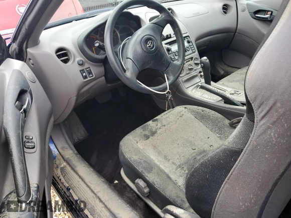 2000 Toyota Celica GT z VIN JTDDR32T2Y0052502, wystawiony jako Copart lot #74485804 z przebiegiem Nie podano mil oraz Nie do naprawy • Non repairable. Historia ofert i sprzedaży dostępna na DreamBid. Obrazek 8.