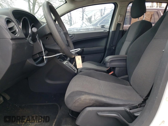 2011 Dodge Caliber Mainstreet with VIN 1B3CB3HA7BD298372, listed as a Copart auction lot 52785185 with 155,315 mi miles and Salvage Title. Bid and sale history available at carsss.com. Image 7.