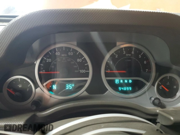 2009 Jeep Wrangler Rubicon with VIN 1J4GA64179L733136, listed as a Copart auction lot 43747805 with 94,899 mi miles and Salvage Title. Bid and sale history available at DreamBid. Image 9.