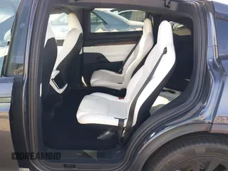 2023 Tesla Model X with VIN 7SAXCBE50PF378548, listed as a IAAI auction lot 41698357 with Not Provided miles and . Bid and sale history available at DreamBid. Image 8.