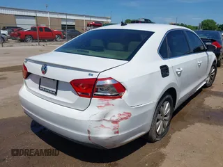 2013 Volkswagen Passat SE with VIN 1VWBP7A32DC007863, listed as a IAAI auction lot 42452096 with 207,083 mi miles and . Bid and sale history available at DreamBid. Image 4.