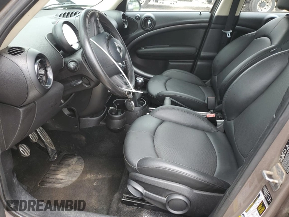 2014 MINI Countryman S z VIN WMWZC5C54EWM17898, wystawiony jako Copart lot #62119635 z przebiegiem 112 773 mil mil oraz Szkoda całkowita • Salvage title. Historia ofert i sprzedaży dostępna na DreamBid. Obrazek 7.