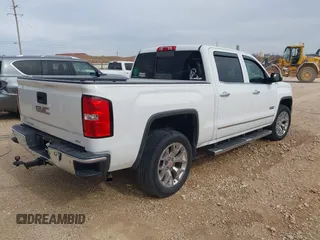 2015 GMC Sierra 1500 SLT with VIN 3GTU2VEC2FG517994, listed as a IAAI auction lot 41786021 with 116,902 mi miles and . Bid and sale history available at DreamBid. Image 4.