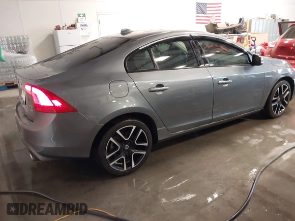 2017 Volvo S60 Dynamic with VIN YV140MTL0H2437537, listed as a IAAI auction lot 40801631 with 55,153 mi miles. Bid and sale history available at carsss.com. Image 4.