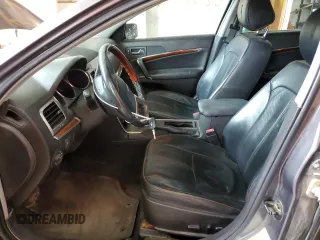 2011 Lincoln MKZ with VIN 3LNHL2JC8BR765423, listed as a Copart auction lot 62016595 with 144,842 mi miles and Salvage title. Bid and sale history available at DreamBid. Image 7.