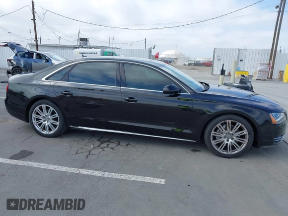 2013 Audi A8 3.0L with VIN WAURGAFD3DN005931, listed as a IAAI auction lot 42461062 with 113,899 mi miles and . Bid and sale history available at DreamBid. Image 13.