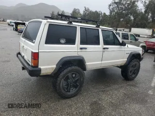 1989 Jeep Cherokee z VIN 1J4FT28LXKL601505, wystawiony jako Copart lot #49312265 z przebiegiem 264 769 mil mil oraz Szkoda całkowita • Salvage title. Historia ofert i sprzedaży dostępna na DreamBid. Obrazek 3.