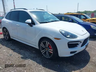 2013 Porsche Cayenne GTS with VIN WP1AD2A29DLA78798, listed as a IAAI auction lot 42450571 with 152,384 mi miles and . Bid and sale history available at DreamBid. Image 1.