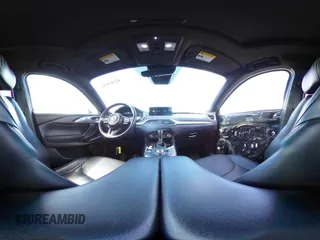 2021 Mazda CX-9 Grand Touring with VIN JM3TCBDY4M0513099, listed as a IAAI auction lot 42563530 with 76,006 mi miles and . Bid and sale history available at DreamBid. Image 19.