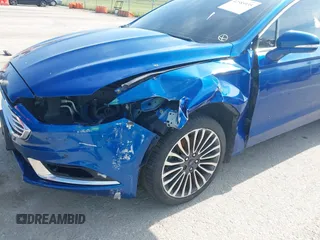 2018 Ford Fusion Titanium with VIN 3FA6P0D92JR205597, listed as a IAAI auction lot 42585935 with 146,072 mi miles and . Bid and sale history available at DreamBid. Image 6.
