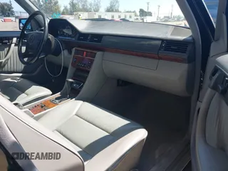 1993 Mercedes-Benz 400 with VIN WDBEA34E6PB942402, listed as a IAAI auction lot 41855899 with 124,065 mi miles. Bid and sale history available at carsss.com. Image 5.