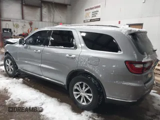 2015 Dodge Durango Limited with VIN 1C4RDJDG3FC729450, listed as a IAAI auction lot 41596260 with 186,495 mi miles and . Bid and sale history available at carsss.com. Image 3.