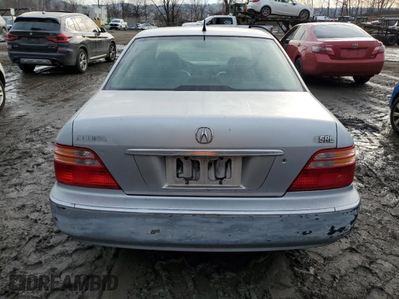 2002 Acura RL с VIN JH4KA96642C012013, выставлен на аукционе Copart как лот 46262295 с пробегом 75 259 миль миль и Списание • Salvage title. История ставок и продаж доступна на DreamBid. Изображение 6.
