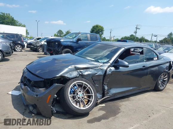 2015 BMW M4 with VIN WBS3U9C5XFJ967725, listed as a IAAI auction lot 42593444 with Not provided miles and . Bid and sale history available at DreamBid. Image 2.