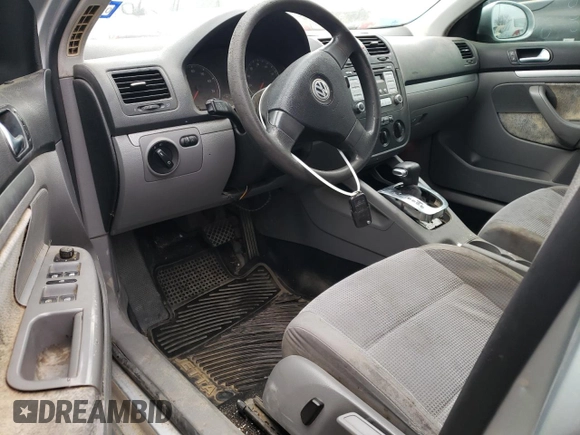 2009 Volkswagen Jetta S z VIN 3VWJM71K79M167562, wystawiony jako Copart lot #80546594 z przebiegiem 196 891 mil mil oraz Szkoda całkowita • Salvage title. Historia ofert i sprzedaży dostępna na DreamBid. Obrazek 8.