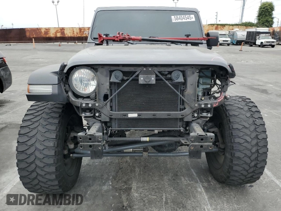 2019 Jeep Wrangler Unlimited Sport S with VIN 1C4HJXDG5KW535115, listed as a Copart auction lot 58404545 with 95,491 mi miles and Salvage title. Bid and sale history available at DreamBid. Image 5.