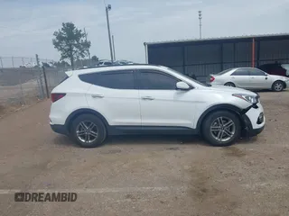 2017 Hyundai Santa Fe 2.4L z VIN 5NMZU3LB4HH026378, wystawiony jako IAAI lot #41906997 z przebiegiem 105 777 mil mil oraz . Historia ofert i sprzedaży dostępna na DreamBid. Obrazek 13.