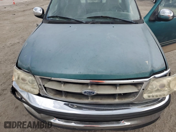 1998 Ford F-150 XL with VIN 1FTRF17L0WNA48153, listed as a Copart auction lot 72606904 with 213,592 mi miles and Non repairable. Bid and sale history available at DreamBid. Image 11.
