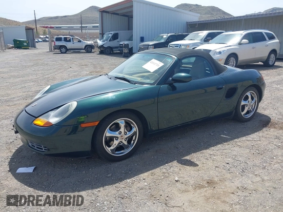 1999 Porsche Boxster with VIN WP0CA2986XU627495, listed as a IAAI auction lot 42112724 with 94,090 mi miles and . Bid and sale history available at DreamBid. Image 2.