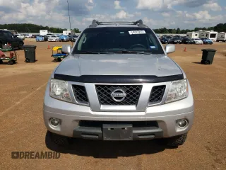 2016 Nissan Frontier Pro-4X with VIN 1N6AD0EV0GN797437, listed as a Copart auction lot 54203245 with 131,021 mi miles and Salvage title. Bid and sale history available at DreamBid. Image 5.