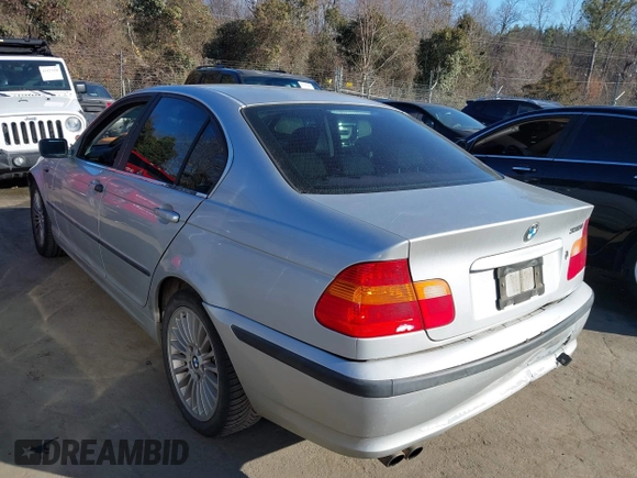 2003 BMW 3 Series 330xi with VIN WBAEW53493PN30296, listed as a IAAI auction lot 41429776 with 233,013 mi miles. Bid and sale history available at carsss.com. Image 3.